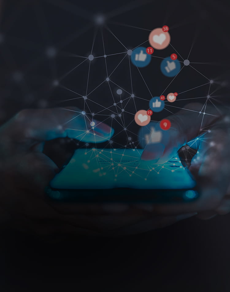 Someone liking and loving things on social media with like and heart icons floating above the cellphone. 